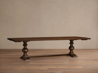 Tuscany Extension Dining Table with dark wooden surface, hand-turned pedestal legs, and vintage brass handles.