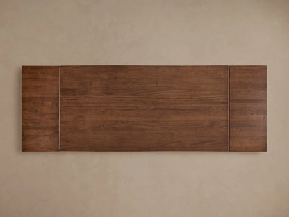Tuscany Extension Dining Table with a rectangular solid poplar wood tabletop, showcasing a warm, rich brown grain texture, viewed from above.