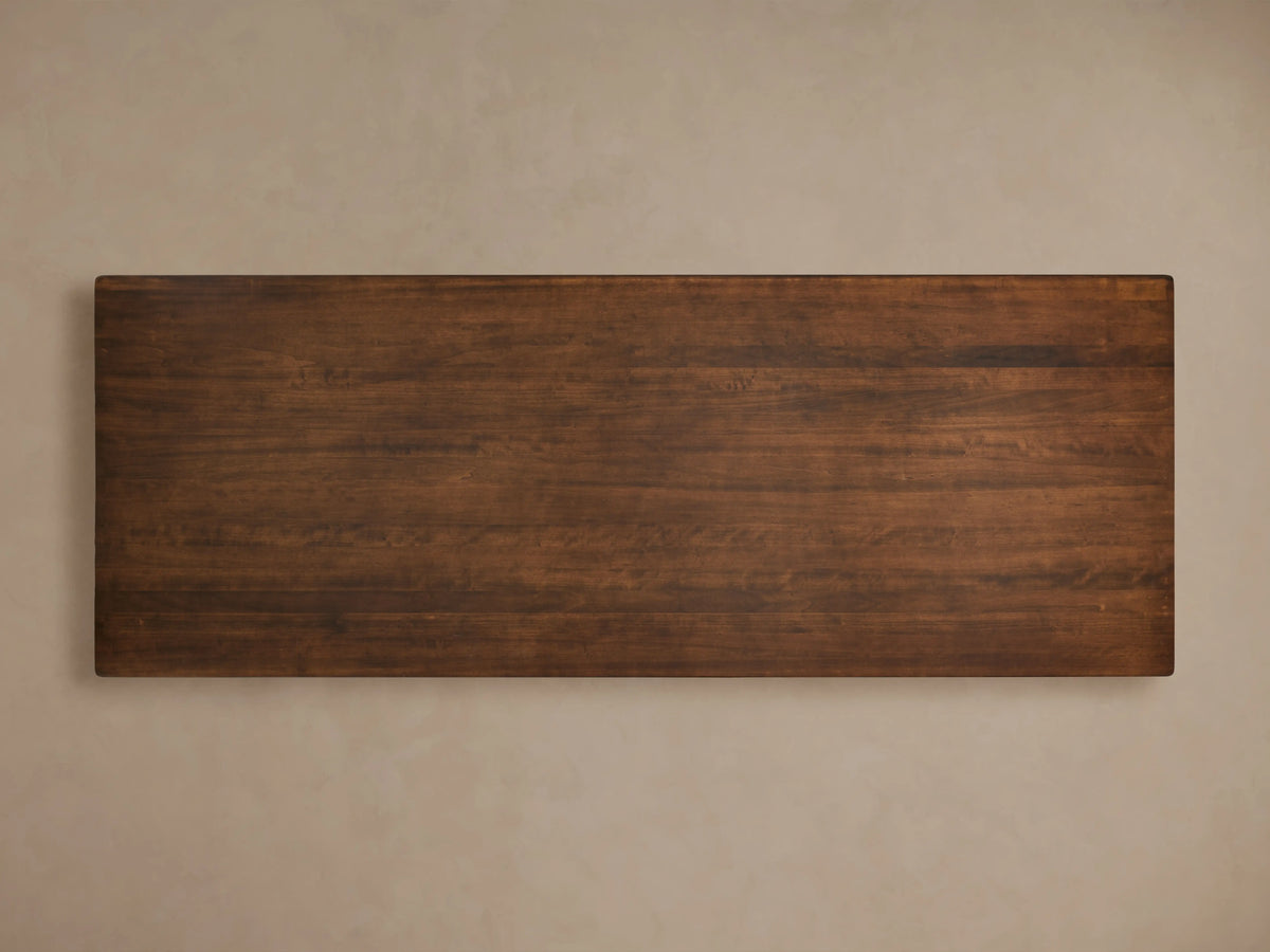 Tuscany Extension Dining Table with a rich, dark wood finish, showcasing a smooth, rectangular tabletop viewed from above.