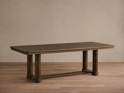 Warby Extension Dining Table in dark wood finish, rectangular shape with two cylindrical legs, on light wooden floor.