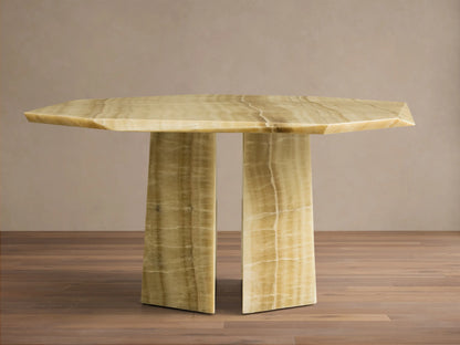 Front view of the green onyx Zyra Round Dining Table, showing its asymmetrical tabletop and split pedestal base with natural veining.
