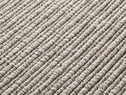Dover Performance Rug, close-up of light beige and brown heathered ribbed texture with distinct diagonal stripes.