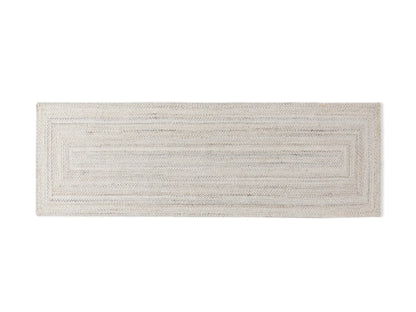 Sansa Performance Runner Rug, light neutral braided rectangular rug with a concentric rectangular border, top-down.