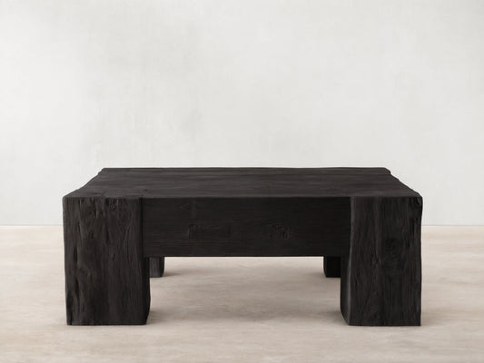 Ubud Square Coffee Table made of reclaimed teak wood with a deep black Shou Sugi Ban finish, exhibiting a textured, charred appearance.