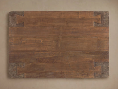Angled close-up of Ubud Coffee Table corner, natural waxed reclaimed teak with prominent wood grain, knots, and robust joinery.