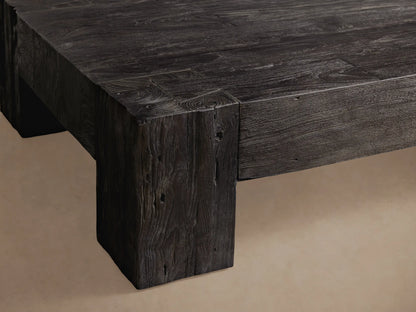 Ubud Coffee Table, dark Shou Sugi Ban reclaimed wood. Low, rectangular table with visible wood grain on a wooden floor.