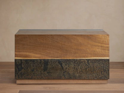Acacius End Table made from reclaimed yukas veneers and oxidized steel. Rectangular, wood grain top, darker textured base.