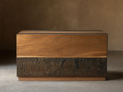 Acacius End Table made from reclaimed yukas veneers and oxidized steel. Rectangular, wood grain top, darker textured base.