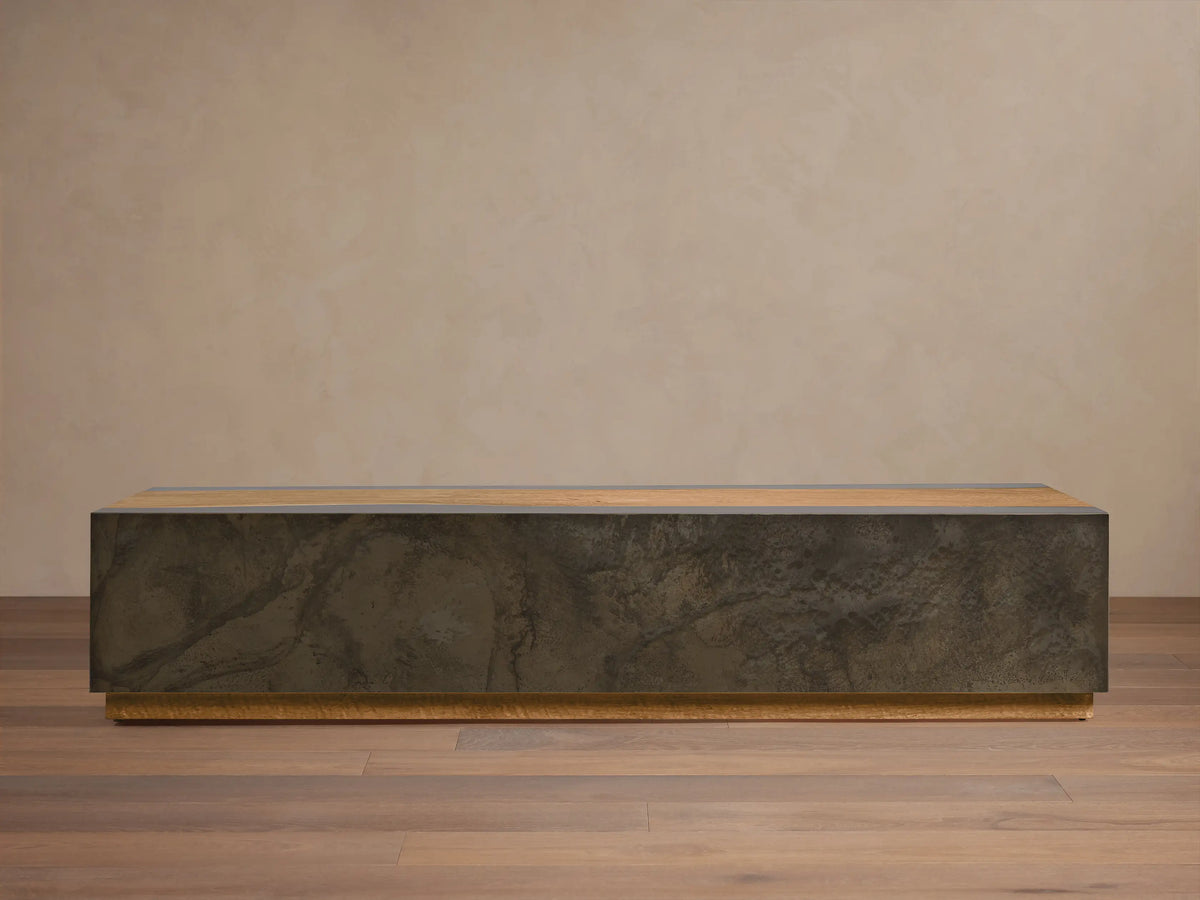 Acacius Long Coffee Table: low, rectangular with dark oxidized steel body and light reclaimed yukas wood top and base.