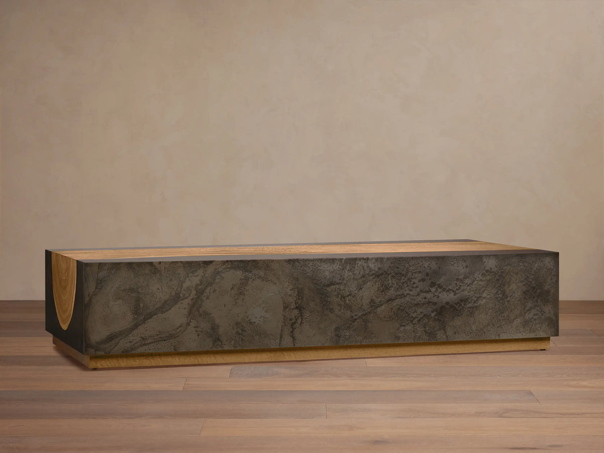 Acacius Long Coffee Table: low, rectangular with dark oxidized steel body and light reclaimed yukas wood top and base.