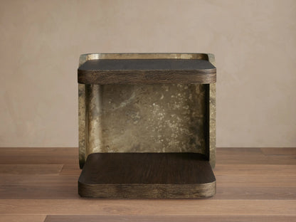 Alvaro End Table: dark brown spalted wood top/base, weathered aluminum sides with mottled gold patina. Front view.