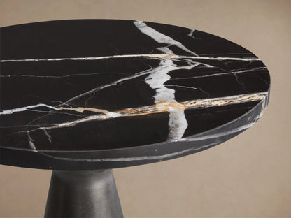 Beaufort Martini Table: Round black marble top with striking white and gold veining, dark gray base.