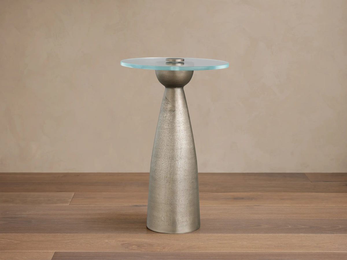 Beaufort Glass Top Martini Table with a clear round glass top on a conical, textured nickel-finished metal base.