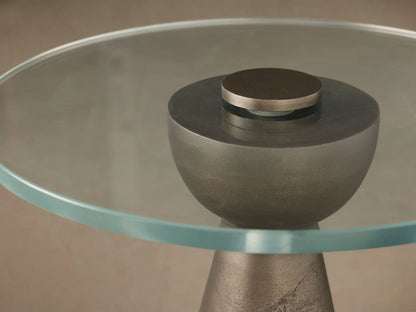Beaufort Glass Top Martini Table with a clear round glass top and a conical, textured nickel-finish cast aluminum base.