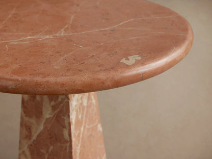Front view of the C-shaped Brecken Indoor Only Martini Table, featuring a mosaic of varied brown and cream natural marble.