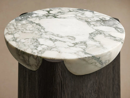 Bellino Martini Table with dark, softly rounded triangular oak base and nested white marble top with grey veining.