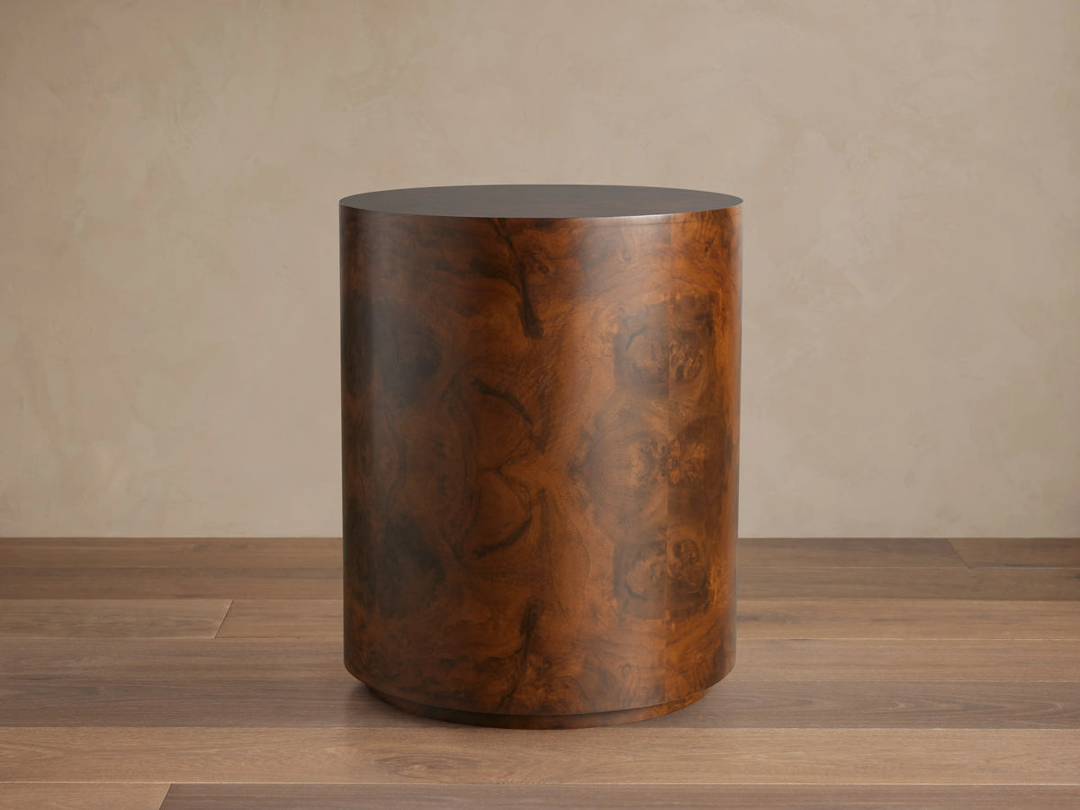 Cylindrical Cinzia Burl End Table made of walnut burl veneer with rich brown tones and unique wood grain patterns.