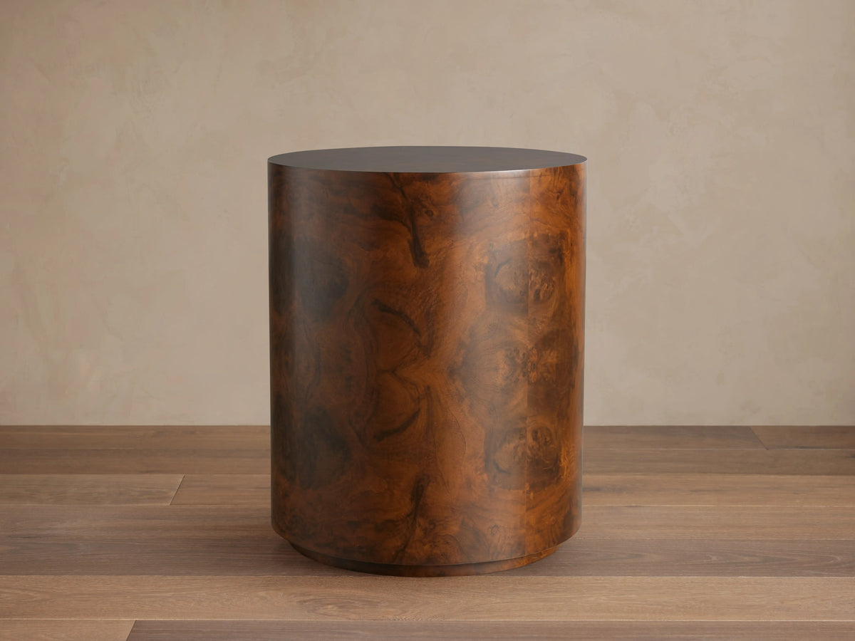 Cylindrical Cinzia Burl End Table made of walnut burl veneer with rich brown tones and unique wood grain patterns.