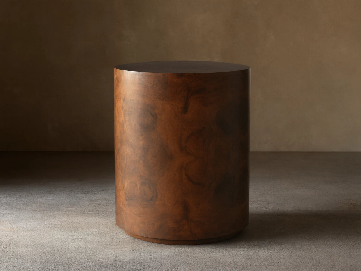 Cylindrical Cinzia Burl End Table made of walnut burl veneer with rich brown tones and unique wood grain patterns.