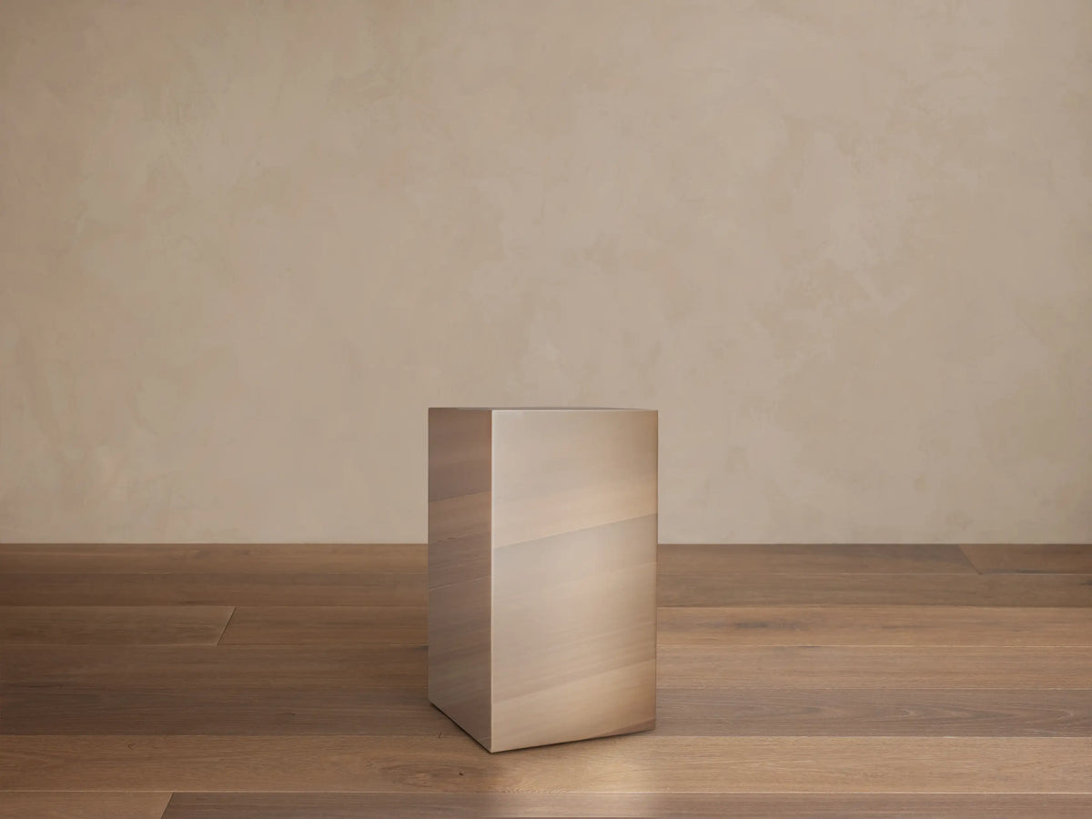 Front view of the Chrome Cinzia Pedestal, a rectangular plinth-style base with a polished, reflective finish.
