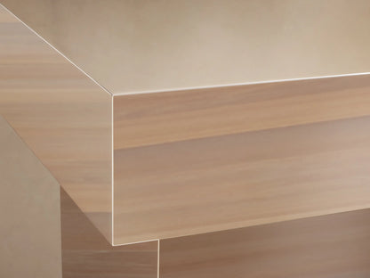 Front view of the Chrome Cinzia Chrome End Table, a radiant, mirror-like metallic table with a geometric plinth base.