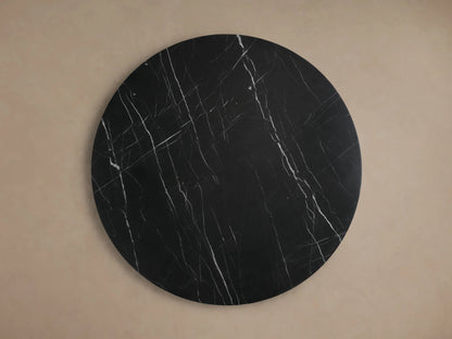 Cinzia Stone Round Coffee Table top view, black marble with white veining patterns, displaying natural swirling and texture.