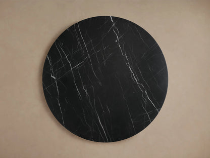 Cinzia Stone Round Coffee Table featuring black marble with white veining, plinth-style base, and a smooth, polished finish.