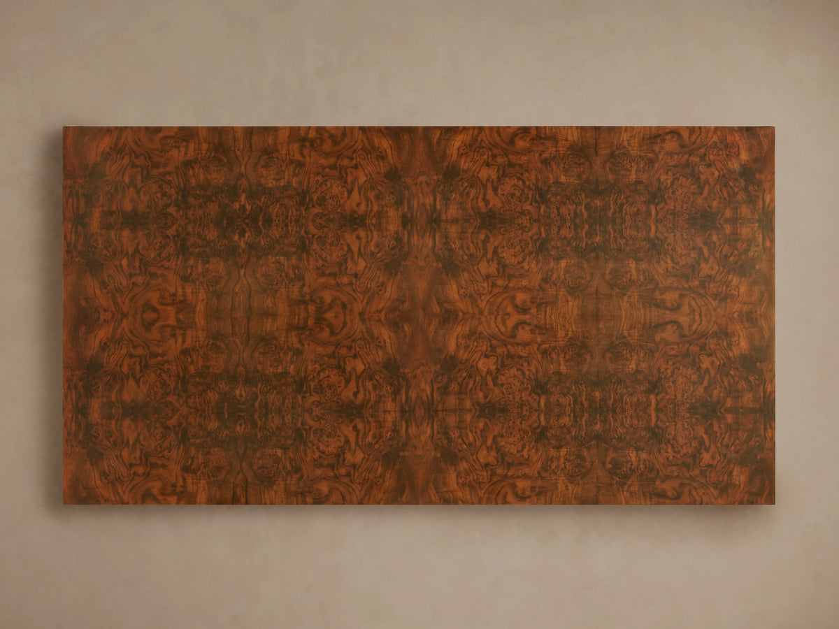Cinzia Burl Coffee Table with a low-profile, plinth-style base, crafted from walnut burl veneer, showcasing bookmatched patterns.