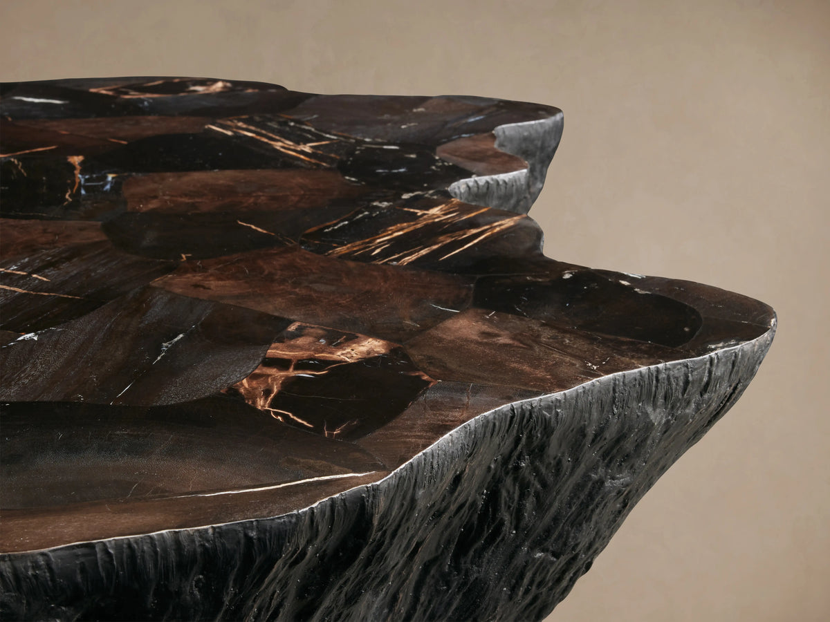 Clayhill Coffee Table with polished petrified wood surface, showcasing unique organic textures and dark earthy tones, irregular edge.