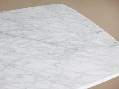 Marble tabletop close-up of the Saint Germain Coffee Table, showcasing the Carrara marble's distinct gray veining on a white background.