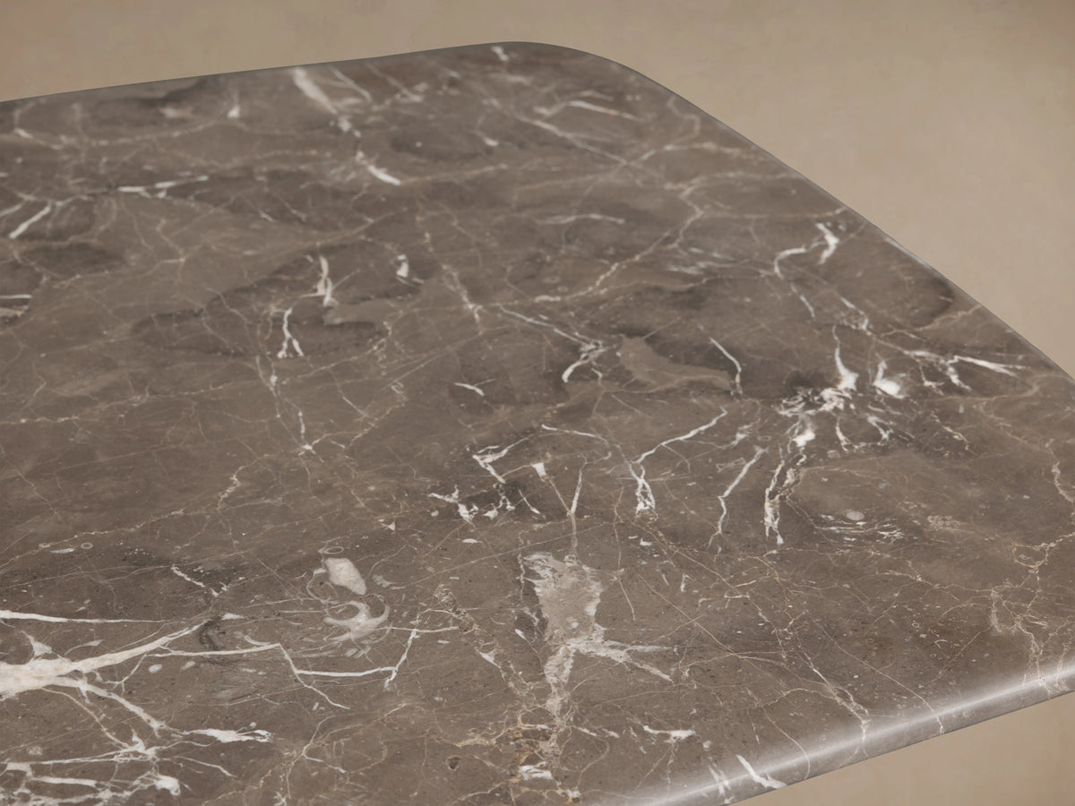 Stone top of the Saint Germain Coffee Table, featuring espresso brown with unique natural veining patterns and a smooth finish.