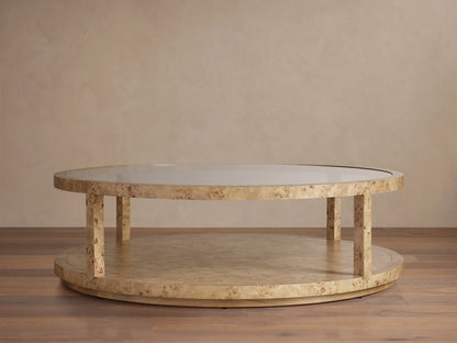 Corey Round Coffee Table in light brown mappa burl wood finish, with circular top and lower shelf connected by vertical supports.