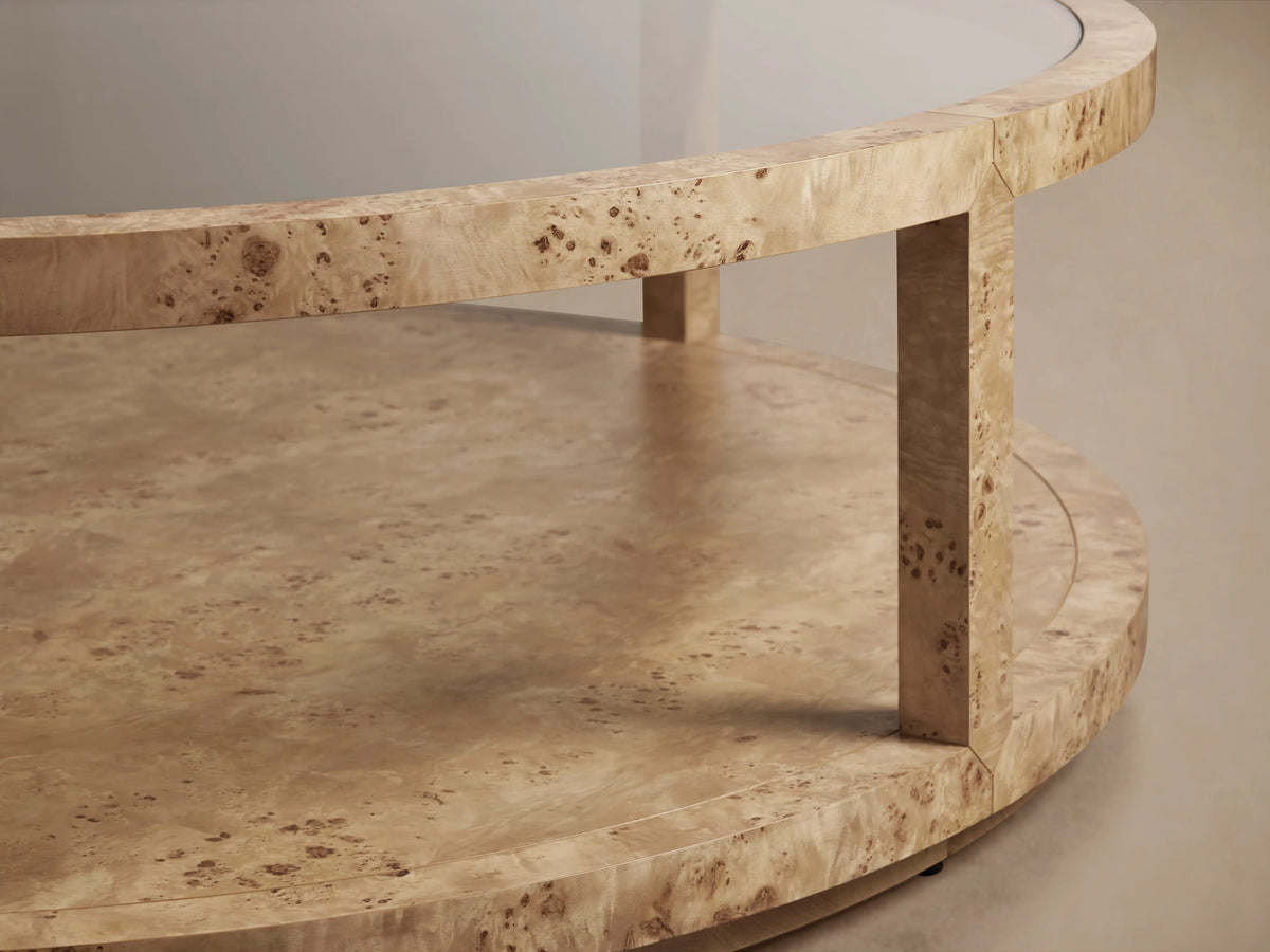 Corey Round Coffee Table with natural mappa burl wood pattern, featuring two shelves and a book-matched design for visual texture.
