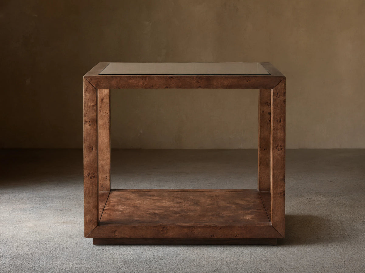 Mappa burl Corey End Table with clear glass top, open cube frame, and lower shelf, featuring rich swirled wood grain.
