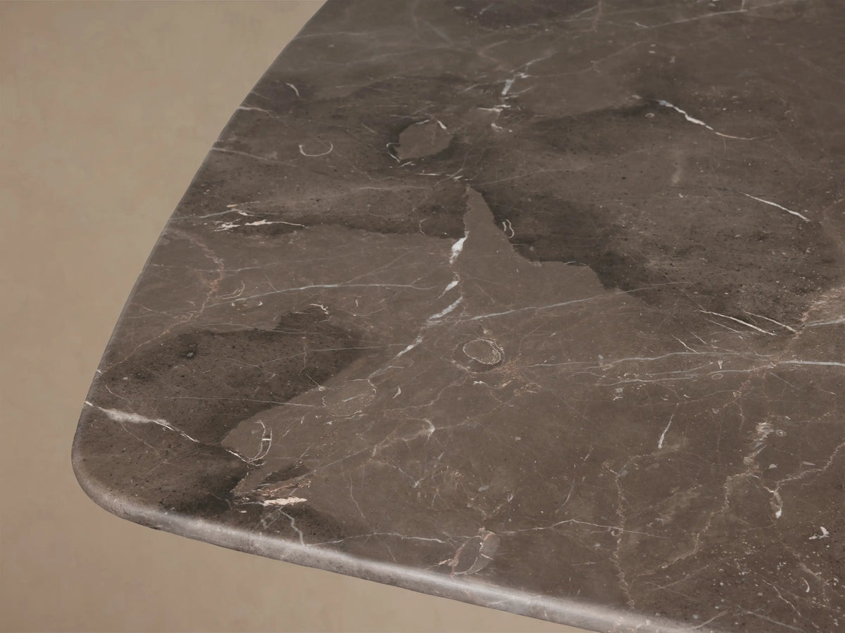 Front view of Saint Germain Stone Coffee Table with Dauphine Base, dark gray honed stone top, two light brown oak veneer pedestal bases.