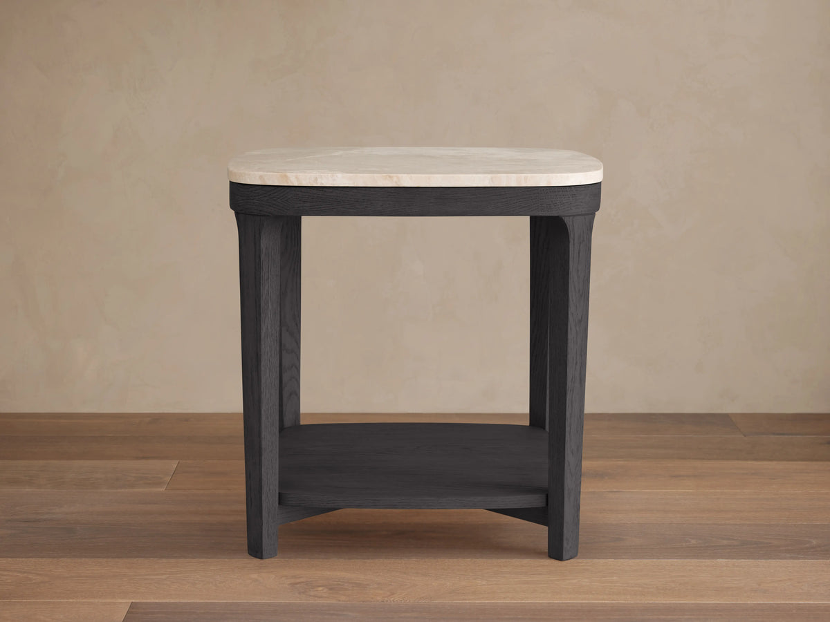 Danny End Table close-up showing an ivory-toned royal cream marble top with natural veining on a dark oak wood base.