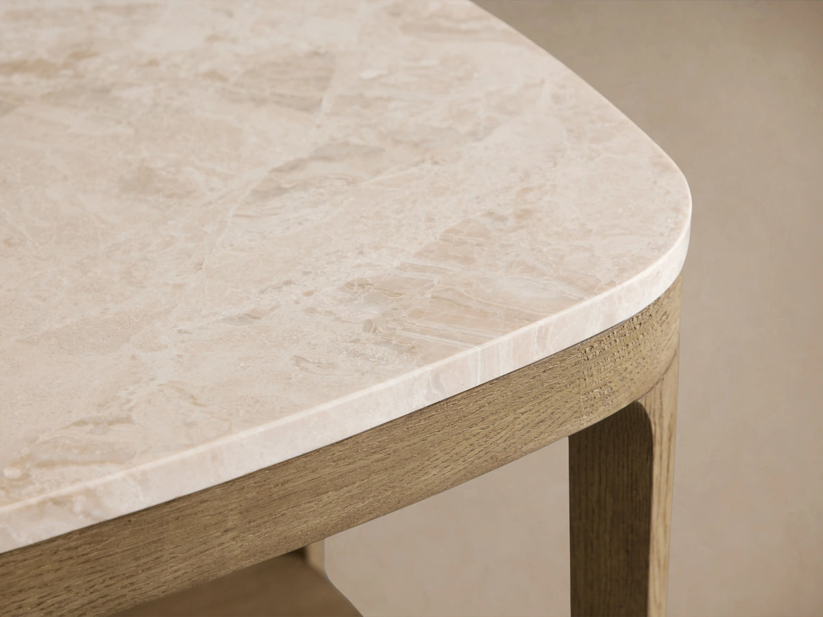 Danny End Table with fawn-finished oak body, white marble top, and clear lacquer. Features lower shelf, on wood floor background.