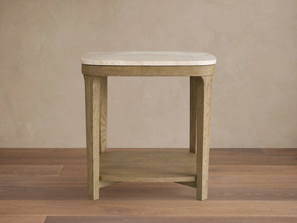 Danny End Table with fawn finish oak wood frame and ivory-toned marble top. Wooden shelf below. Set against plain background.