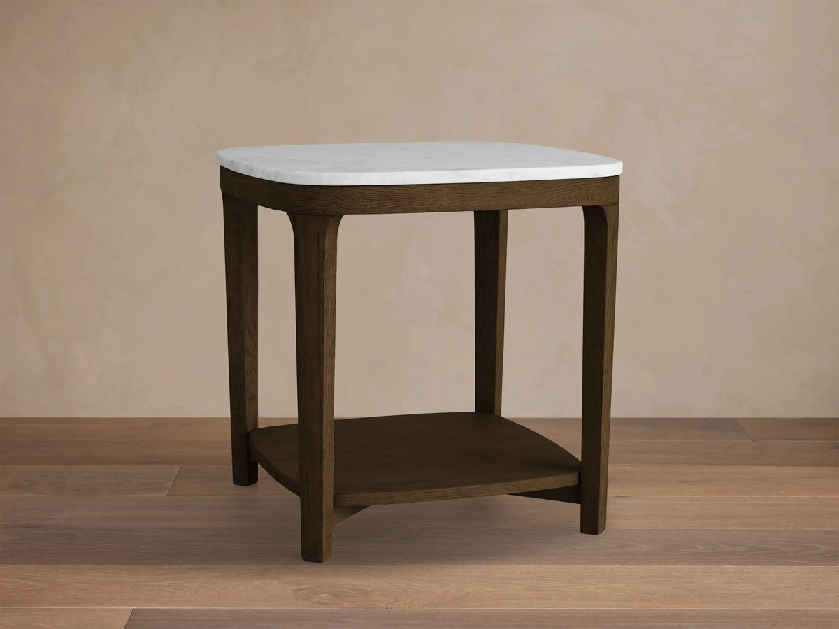 Front view of a dark brown wooden side table with a white marble top and a lower shelf.