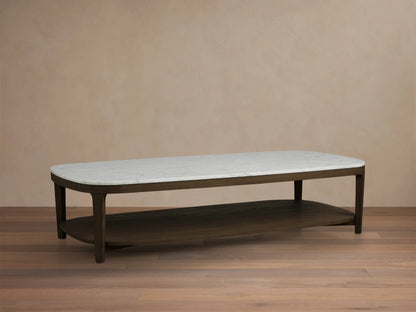 Front view of an oval coffee table with a white marble top and a dark brown wood frame and lower shelf.