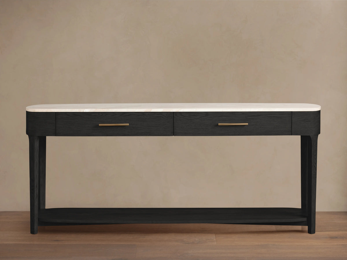 Front view of Danny Console Table with dark ebony oak frame, white marble top, two drawers with brass pulls, and lower shelf.