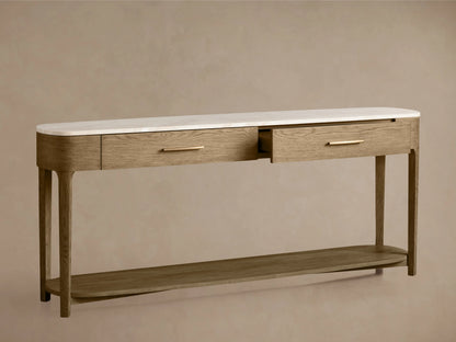 Oak Danny Console Table with white marble top, featuring two drawers with brass pulls. One drawer is slightly open.
