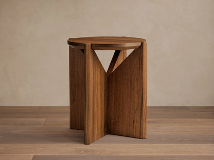 Elien End Table with round top, crafted in walnut veneer, featuring knife-edge detailing and oil finish, on wooden floor.