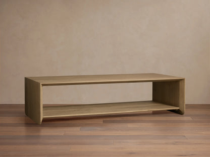 Felton Coffee Table crafted from solid oak, showing two-tier design with smooth, rounded edges and natural wood grain pattern.