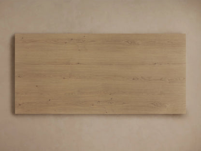 Felton Coffee Table made from solid oak, showcasing a rectangular shape with an open shelf design. Light brown finish on wood grain.