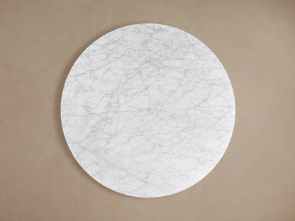 Finnley Round Coffee Table with a smooth white marble top and dark vertical ridged wood base, showcasing modern elegance.