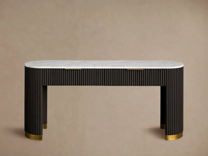 Finnley Storage Console Table with a white marble top, dark slatted wood drawer, and brass handle on a light background.