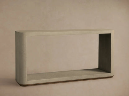 Close-up of Harrow Console Table, light tan, featuring a detailed, pebbled shagreen-embossed texture on its curved top surface.