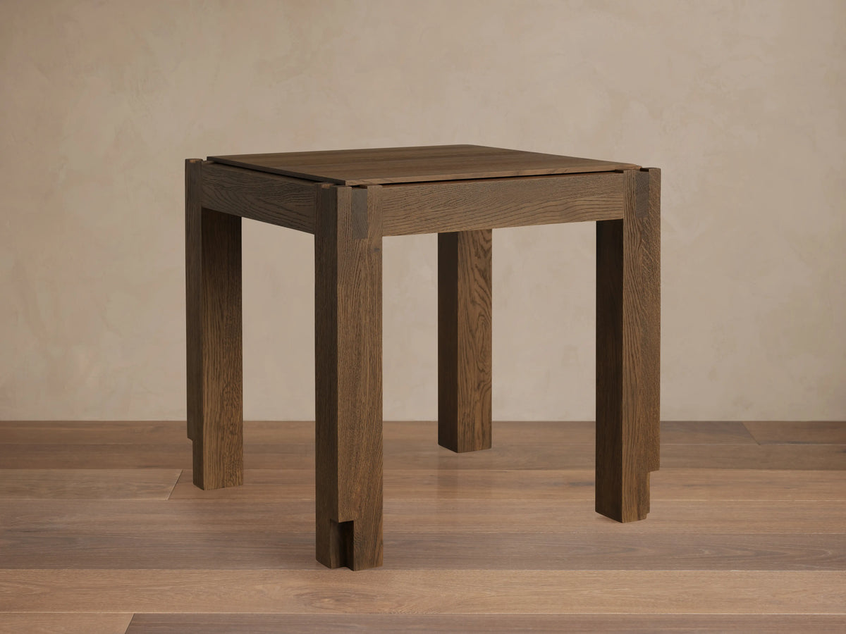 Harlan End Table in solid oak wood with a square top, finished in a dark stain, featuring sturdy block legs.