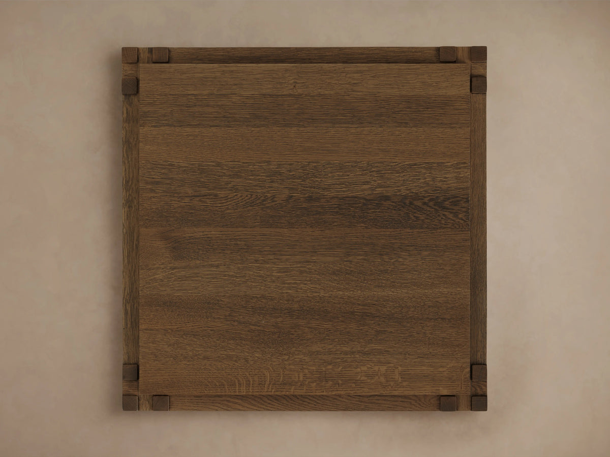 Harlan End Table crafted from solid oak wood, featuring clean lines, square top, and a rich brown stain with a subtle sheen.